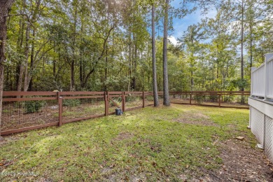 Tucked among the trees in the waterfront community of Fairfield on Harbour Point Golf Club in North Carolina - for sale on GolfHomes.com, golf home, golf lot