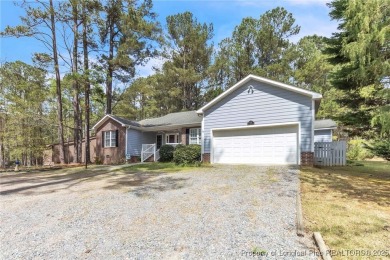 Welcome to this gorgeous home in the desirable Golf North on Carolina Trace Country Club in North Carolina - for sale on GolfHomes.com, golf home, golf lot