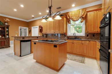 A grand traditional residence, this 3-bedroom, 3.5-bath home is on The Oaks Club in Florida - for sale on GolfHomes.com, golf home, golf lot