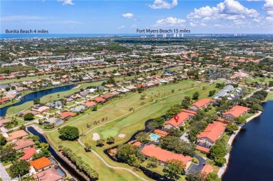 Wake up to sweeping golf course views and end the day with on Spanish Wells Golf and Country Club in Florida - for sale on GolfHomes.com, golf home, golf lot