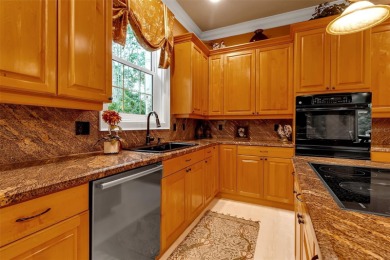 A grand traditional residence, this 3-bedroom, 3.5-bath home is on The Oaks Club in Florida - for sale on GolfHomes.com, golf home, golf lot