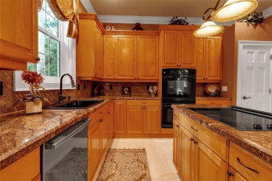 A grand traditional residence, this 3-bedroom, 3.5-bath home is on The Oaks Club in Florida - for sale on GolfHomes.com, golf home, golf lot