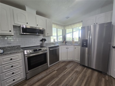 Fully renovated home in Zellwood Station, 2 bedrooms, 2 baths on Zellwood Station Country Club in Florida - for sale on GolfHomes.com, golf home, golf lot