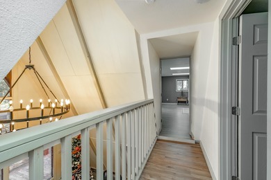 Welcome to 50 Knollwood Way, a quintessential A-frame chalet on Angel Fire Resort Country Club in New Mexico - for sale on GolfHomes.com, golf home, golf lot