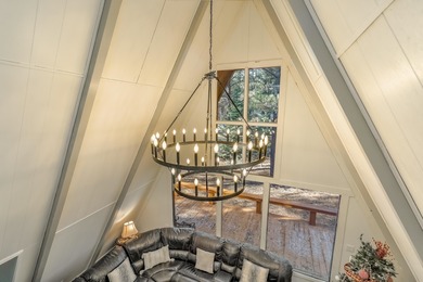 Welcome to 50 Knollwood Way, a quintessential A-frame chalet on Angel Fire Resort Country Club in New Mexico - for sale on GolfHomes.com, golf home, golf lot