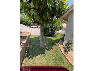 Tivioli Plan 200 on quiet street - upgraded cabinets in kitchen on Sun Lakes Country Club in California - for sale on GolfHomes.com, golf home, golf lot