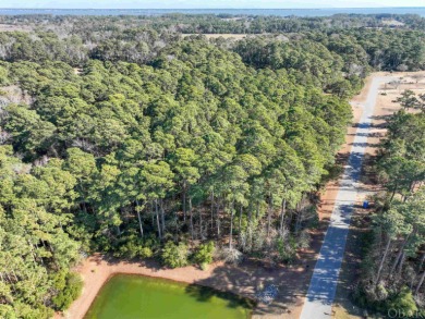Serenity now! This .91-acre semi-soundfront parcel is in the on Holly Ridge Golf Course in North Carolina - for sale on GolfHomes.com, golf home, golf lot