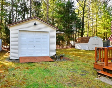 Step into rustic charm with this almost all-knotty pine interior on Birch Pointe Golf Club in Michigan - for sale on GolfHomes.com, golf home, golf lot