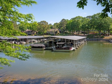 Beautifully updated end unit home overlooking lake and private on River Hills Country Club in South Carolina - for sale on GolfHomes.com, golf home, golf lot