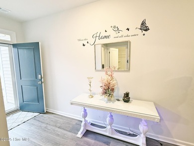 Welcome to 1610 Lightered Knot Court SE, a beautifully upgraded on Lennon Hills Golf Course in North Carolina - for sale on GolfHomes.com, golf home, golf lot