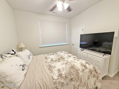 Welcome to 1610 Lightered Knot Court SE, a beautifully upgraded on Lennon Hills Golf Course in North Carolina - for sale on GolfHomes.com, golf home, golf lot