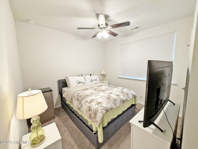 Welcome to 1610 Lightered Knot Court SE, a beautifully upgraded on Lennon Hills Golf Course in North Carolina - for sale on GolfHomes.com, golf home, golf lot