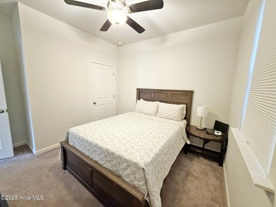 Welcome to 1610 Lightered Knot Court SE, a beautifully upgraded on Lennon Hills Golf Course in North Carolina - for sale on GolfHomes.com, golf home, golf lot