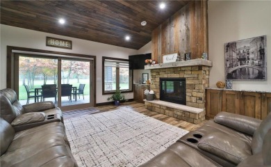 Don't miss this three-bedroom, four-bath custom-built home. Home on Blueberry Pines Golf CLub in Minnesota - for sale on GolfHomes.com, golf home, golf lot