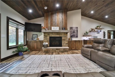 Don't miss this three-bedroom, four-bath custom-built home. Home on Blueberry Pines Golf CLub in Minnesota - for sale on GolfHomes.com, golf home, golf lot