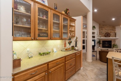 Discover this exceptional custom-built pool home featuring on London Bridge Golf Course in Arizona - for sale on GolfHomes.com, golf home, golf lot