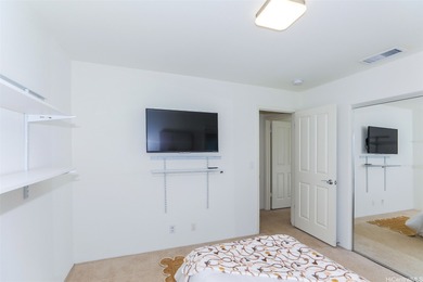 Gorgeous beach-style home on a premium lot located in Kuapapa at on Hoakalei Country Club At Ocean Pointe in Hawaii - for sale on GolfHomes.com, golf home, golf lot