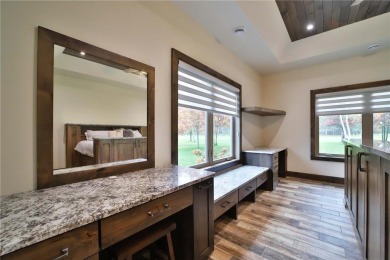 Don't miss this three-bedroom, four-bath custom-built home. Home on Blueberry Pines Golf CLub in Minnesota - for sale on GolfHomes.com, golf home, golf lot