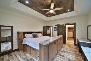 Don't miss this three-bedroom, four-bath custom-built home. Home on Blueberry Pines Golf CLub in Minnesota - for sale on GolfHomes.com, golf home, golf lot