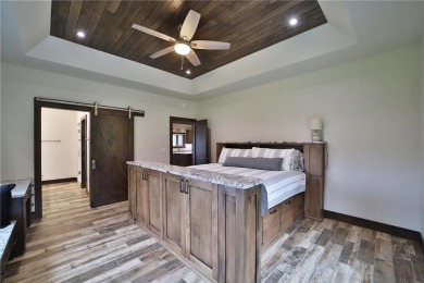 Don't miss this three-bedroom, four-bath custom-built home. Home on Blueberry Pines Golf CLub in Minnesota - for sale on GolfHomes.com, golf home, golf lot
