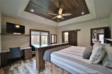 Don't miss this three-bedroom, four-bath custom-built home. Home on Blueberry Pines Golf CLub in Minnesota - for sale on GolfHomes.com, golf home, golf lot