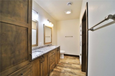 Don't miss this three-bedroom, four-bath custom-built home. Home on Blueberry Pines Golf CLub in Minnesota - for sale on GolfHomes.com, golf home, golf lot