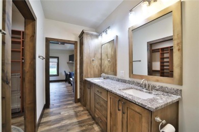 Don't miss this three-bedroom, four-bath custom-built home. Home on Blueberry Pines Golf CLub in Minnesota - for sale on GolfHomes.com, golf home, golf lot