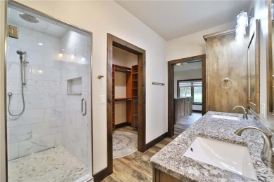 Don't miss this three-bedroom, four-bath custom-built home. Home on Blueberry Pines Golf CLub in Minnesota - for sale on GolfHomes.com, golf home, golf lot
