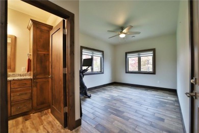 Don't miss this three-bedroom, four-bath custom-built home. Home on Blueberry Pines Golf CLub in Minnesota - for sale on GolfHomes.com, golf home, golf lot
