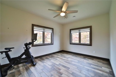 Don't miss this three-bedroom, four-bath custom-built home. Home on Blueberry Pines Golf CLub in Minnesota - for sale on GolfHomes.com, golf home, golf lot
