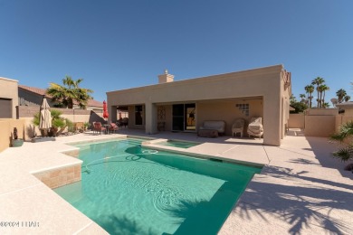 Discover this exceptional custom-built pool home featuring on London Bridge Golf Course in Arizona - for sale on GolfHomes.com, golf home, golf lot