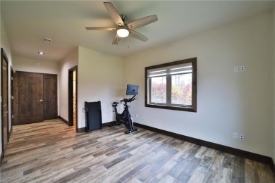 Don't miss this three-bedroom, four-bath custom-built home. Home on Blueberry Pines Golf CLub in Minnesota - for sale on GolfHomes.com, golf home, golf lot