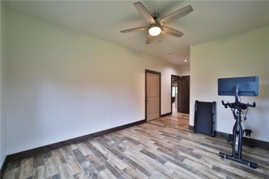 Don't miss this three-bedroom, four-bath custom-built home. Home on Blueberry Pines Golf CLub in Minnesota - for sale on GolfHomes.com, golf home, golf lot