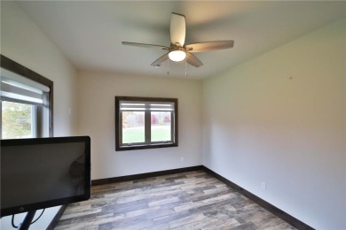 Don't miss this three-bedroom, four-bath custom-built home. Home on Blueberry Pines Golf CLub in Minnesota - for sale on GolfHomes.com, golf home, golf lot