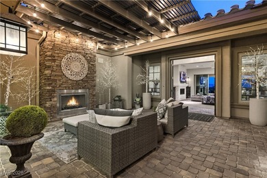 Located in the exclusive guard-gated Southern Highlands Golf on Southern Highlands Golf Club in Nevada - for sale on GolfHomes.com, golf home, golf lot