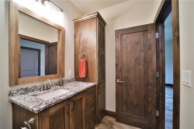 Don't miss this three-bedroom, four-bath custom-built home. Home on Blueberry Pines Golf CLub in Minnesota - for sale on GolfHomes.com, golf home, golf lot