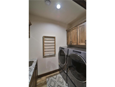 Don't miss this three-bedroom, four-bath custom-built home. Home on Blueberry Pines Golf CLub in Minnesota - for sale on GolfHomes.com, golf home, golf lot