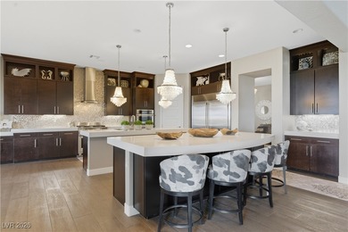 Located in the exclusive guard-gated Southern Highlands Golf on Southern Highlands Golf Club in Nevada - for sale on GolfHomes.com, golf home, golf lot