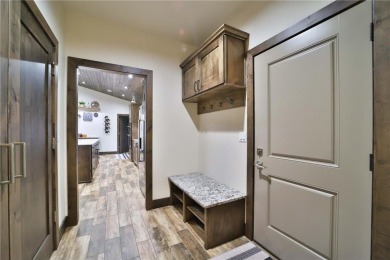 Don't miss this three-bedroom, four-bath custom-built home. Home on Blueberry Pines Golf CLub in Minnesota - for sale on GolfHomes.com, golf home, golf lot