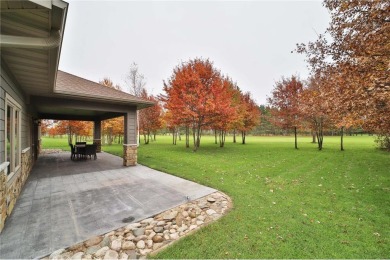 Don't miss this three-bedroom, four-bath custom-built home. Home on Blueberry Pines Golf CLub in Minnesota - for sale on GolfHomes.com, golf home, golf lot