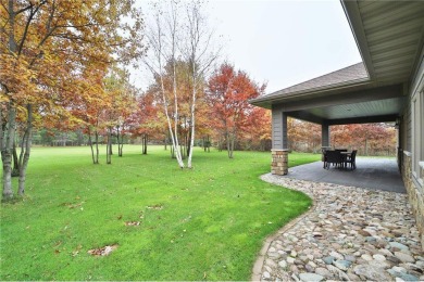 Don't miss this three-bedroom, four-bath custom-built home. Home on Blueberry Pines Golf CLub in Minnesota - for sale on GolfHomes.com, golf home, golf lot