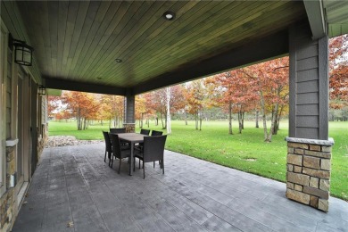 Don't miss this three-bedroom, four-bath custom-built home. Home on Blueberry Pines Golf CLub in Minnesota - for sale on GolfHomes.com, golf home, golf lot