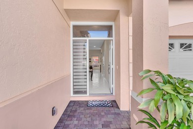 Welcome to this beautiful 4-bedroom, 3.5-bath townhome in on PGA National Golf Club in Florida - for sale on GolfHomes.com, golf home, golf lot