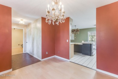 Welcome to this inviting brick ranch-style home perfectly on Sunkist Country Club, Inc. in Mississippi - for sale on GolfHomes.com, golf home, golf lot