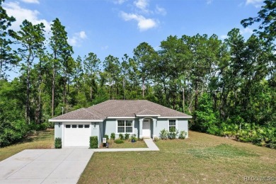 Better-Than-New Citrus Springs beauty offers durability and on Pine Ridge Community Golf and Country Club in Florida - for sale on GolfHomes.com, golf home, golf lot