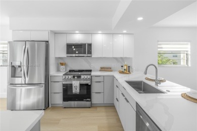 Stunning Fully Remodeled Corner Unit. Spacious & Elegant! on Flamingo Lakes Country Club in Florida - for sale on GolfHomes.com, golf home, golf lot