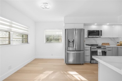 Stunning Fully Remodeled Corner Unit. Spacious & Elegant! on Flamingo Lakes Country Club in Florida - for sale on GolfHomes.com, golf home, golf lot