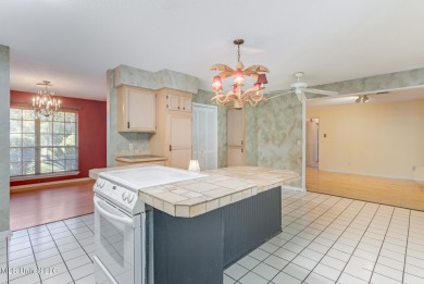 Welcome to this inviting brick ranch-style home perfectly on Sunkist Country Club, Inc. in Mississippi - for sale on GolfHomes.com, golf home, golf lot