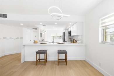 Stunning Fully Remodeled Corner Unit. Spacious & Elegant! on Flamingo Lakes Country Club in Florida - for sale on GolfHomes.com, golf home, golf lot