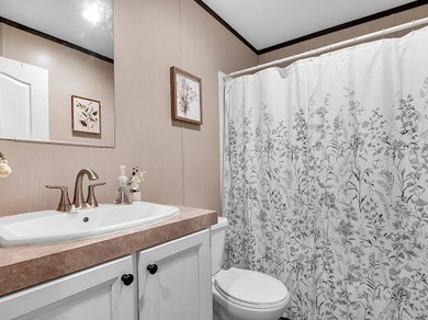 Nestled among the pines, this charming 2-bedroom, 2-bath turnkey on Rayburn Country Club in Texas - for sale on GolfHomes.com, golf home, golf lot